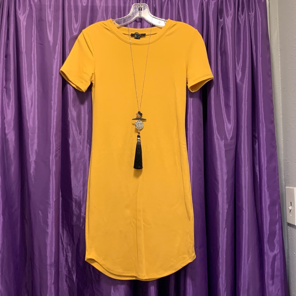 Gold , nice lil what they call t-shirt dress , but this is alittle nicer